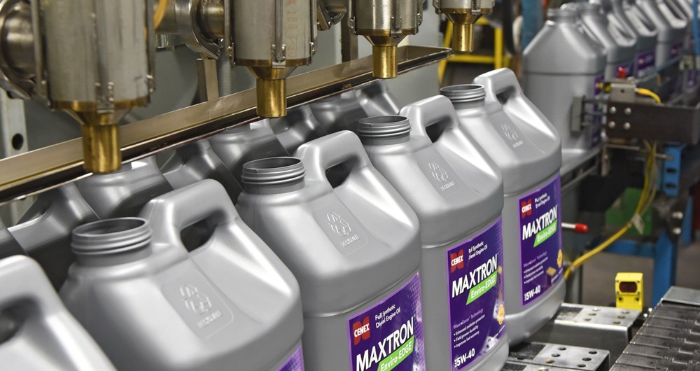 Maxtron fuel containers being filled on a line